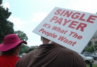 Person Holding a Sign that Says "Single Payer is What the People Want"