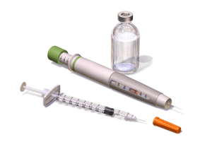 Syringes and insulin bottle.