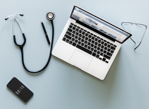 Displays stethoscope and laptop to illustrate virtual care